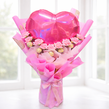 Pink heart foil balloon bouquet with artificial pink roses and Ferrero chocolates, romantic gift arrangement