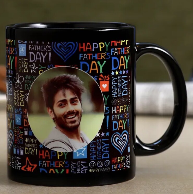 Forever My Hero Mug featuring a personalized photo and colorful Fathers Day design printed on a premium black ceramic mug by Send My Feelings.