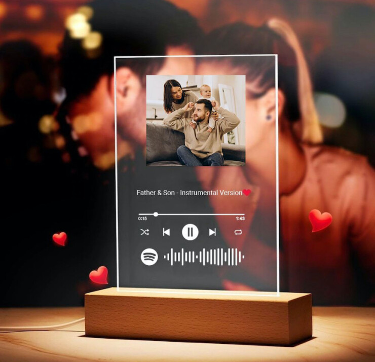 Customized Spotify acrylic photo frame with song code and picture displayed on wooden LED base, perfect personalized music gift