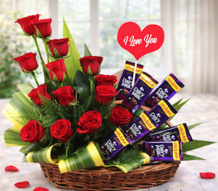 Cane basket of 14 red roses with Dairy Milk chocolates romantic gift