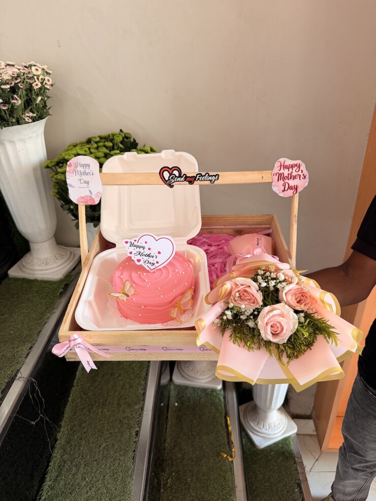 Mother’s Day wooden tray with pink bento pineapple cake and mini fresh flower bouquet.