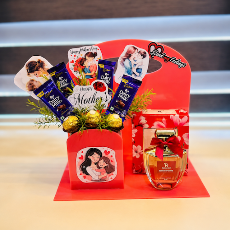 Mother’s Day acrylic red hamper with perfume, Dairy Milk chocolates, Ferrero Rocher, and decorative tags.