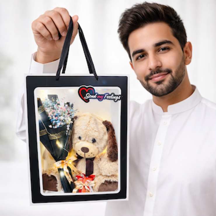 Cute dog teddy in transparent carry bag with fairy lights, chocolates and baby breath flowers