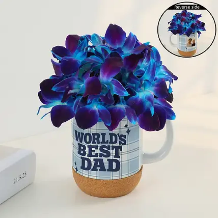 World's Best Dad Orchid Mug featuring vibrant blue orchids arranged in a dad-themed ceramic mug by Send My Feelings.