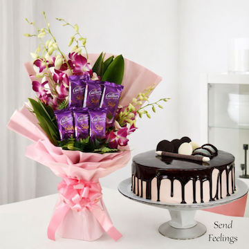 Purple orchid bouquet with Cadbury Silk chocolates and chocolate cake gift combo