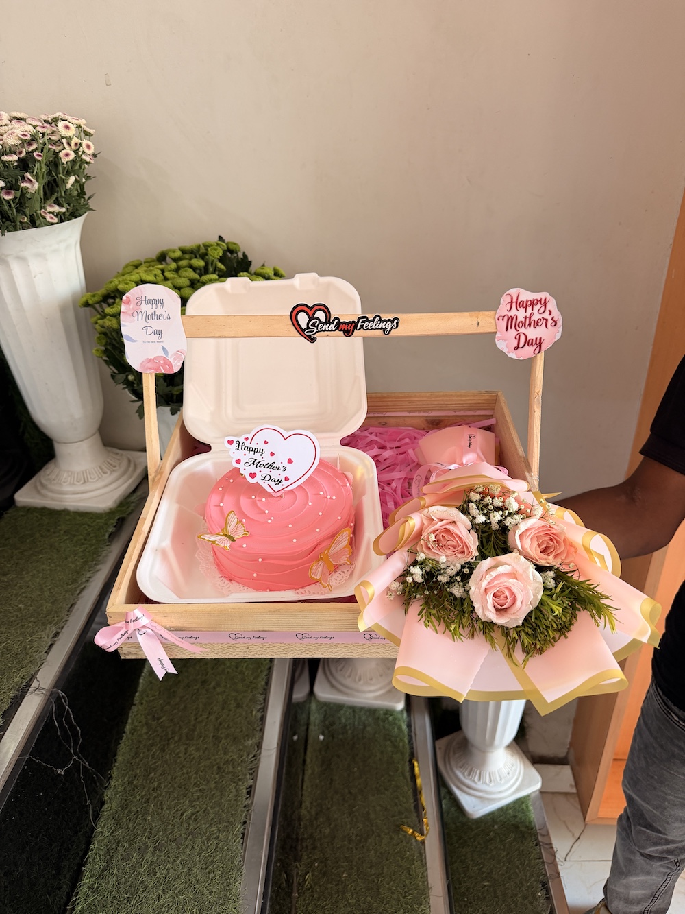Mother’s Day wooden tray with pink bento pineapple cake and mini fresh flower bouquet.